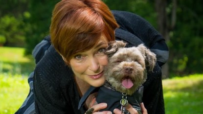 Carolyn Hennesy and her rescue dog, Bela